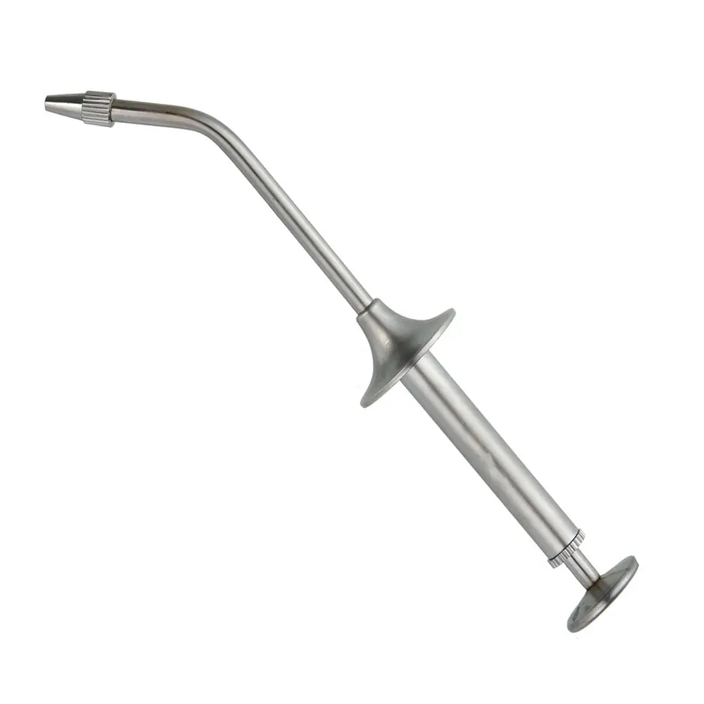 Dental amalgam gun for filling cavities with amalgam in dental clinic Dental amalgam gun for filling cavities with amalgam in dental clinic